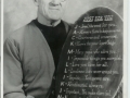 Jack Millikin with a plaque given to him from "The Red Barn"